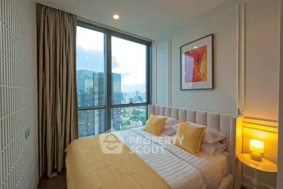 Luxurious bedroom with stunning city view and modern decor