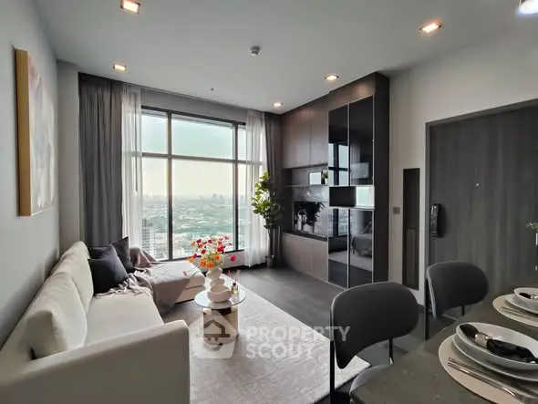 Modern living room with city view, stylish furniture, and elegant decor