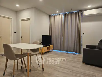 Modern living room with stylish furniture and natural light