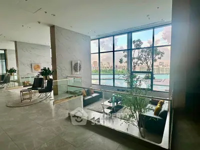 Luxurious modern living area with panoramic city view and elegant decor