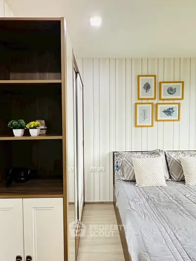 Modern bedroom with stylish decor and cozy bedding