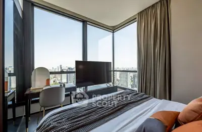 Luxurious bedroom with stunning city view and modern decor