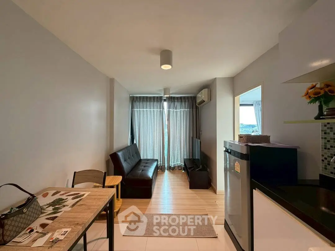 Modern living room with sleek furniture and natural light