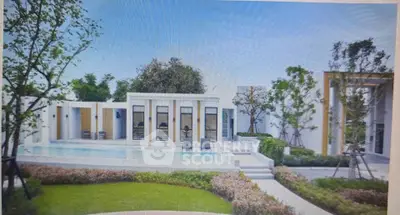 Luxurious modern villa with pool and lush garden, perfect for serene living.