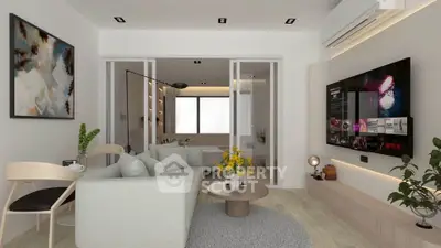 Modern living room with sleek furniture and large TV, open layout to bedroom.