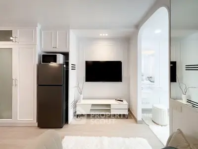 Modern living room with sleek TV setup and stylish decor