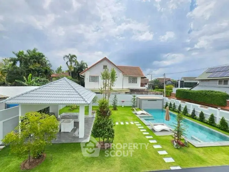 Luxurious property with pool and garden, perfect for relaxation and outdoor activities.