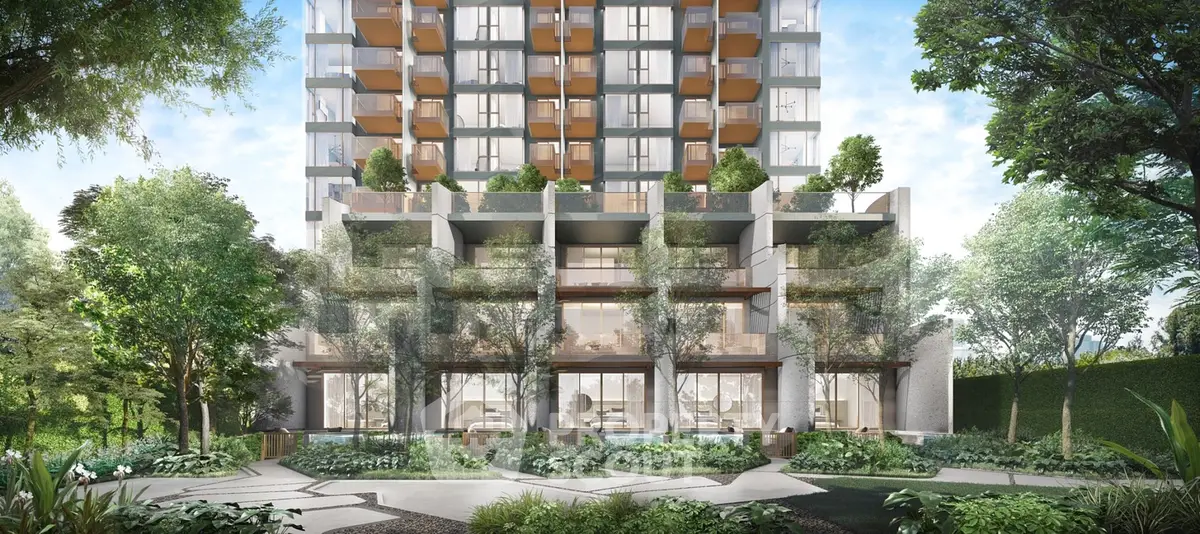 Luxurious modern building exterior with lush greenery and spacious balconies.