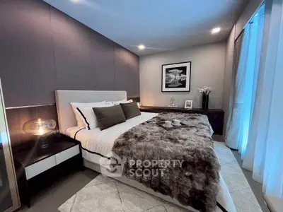 Luxurious modern bedroom with elegant decor and cozy ambiance