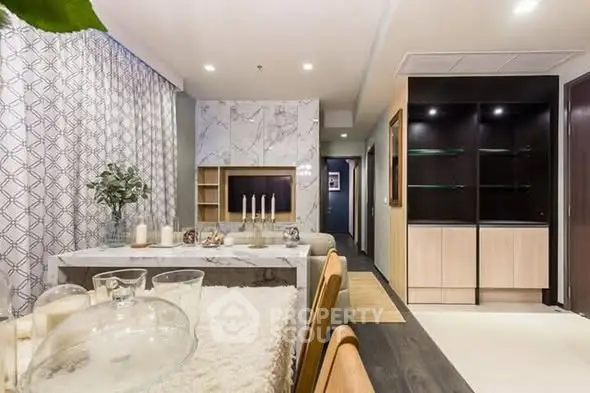 Luxurious modern living room with elegant decor and marble accents