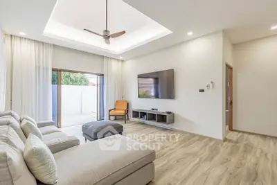 Spacious modern living room with elegant decor and natural light