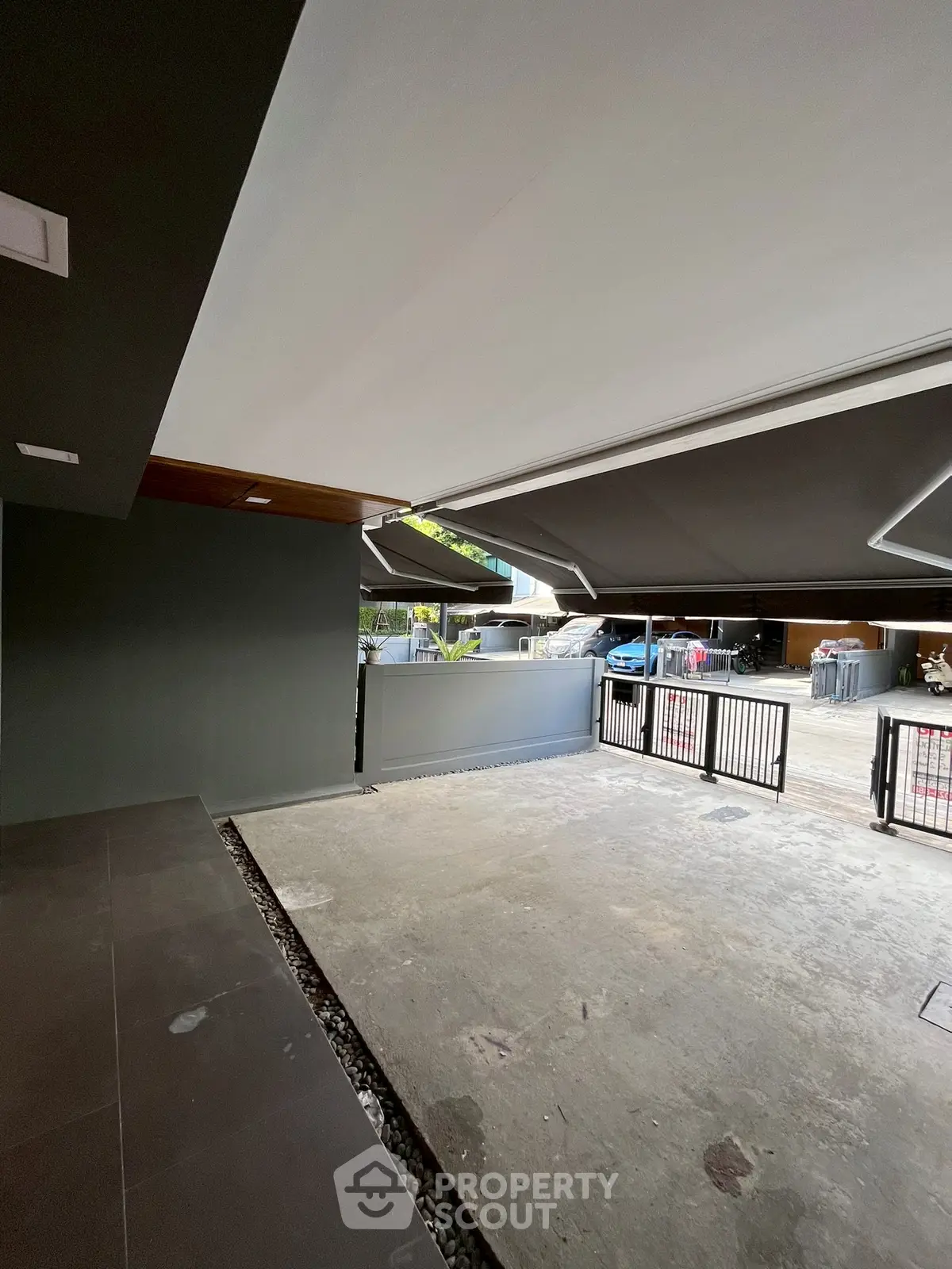 Spacious modern parking area with sleek design and ample space for vehicles.