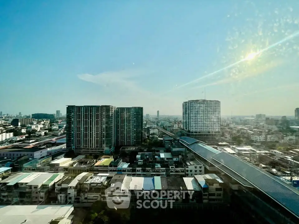 Stunning cityscape view from high-rise building showcasing urban skyline and modern architecture.