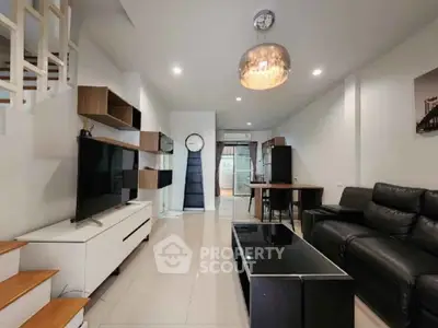 Modern living room with sleek furniture and stylish lighting