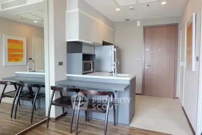 Modern kitchen with sleek design and breakfast bar in stylish apartment