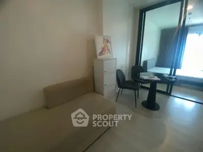 Cozy living area with modern furniture and natural light