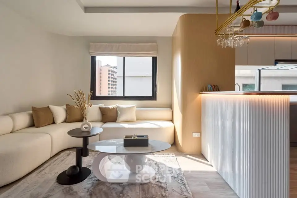 Modern living room with stylish furniture and natural light