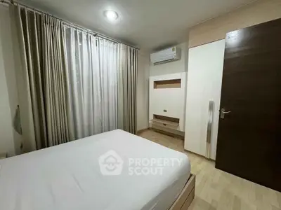 Cozy bedroom with modern design and natural light