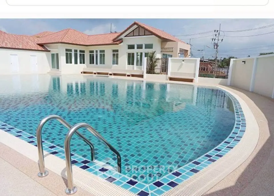 Stunning residential pool with modern design and serene ambiance, perfect for relaxation and leisure.
