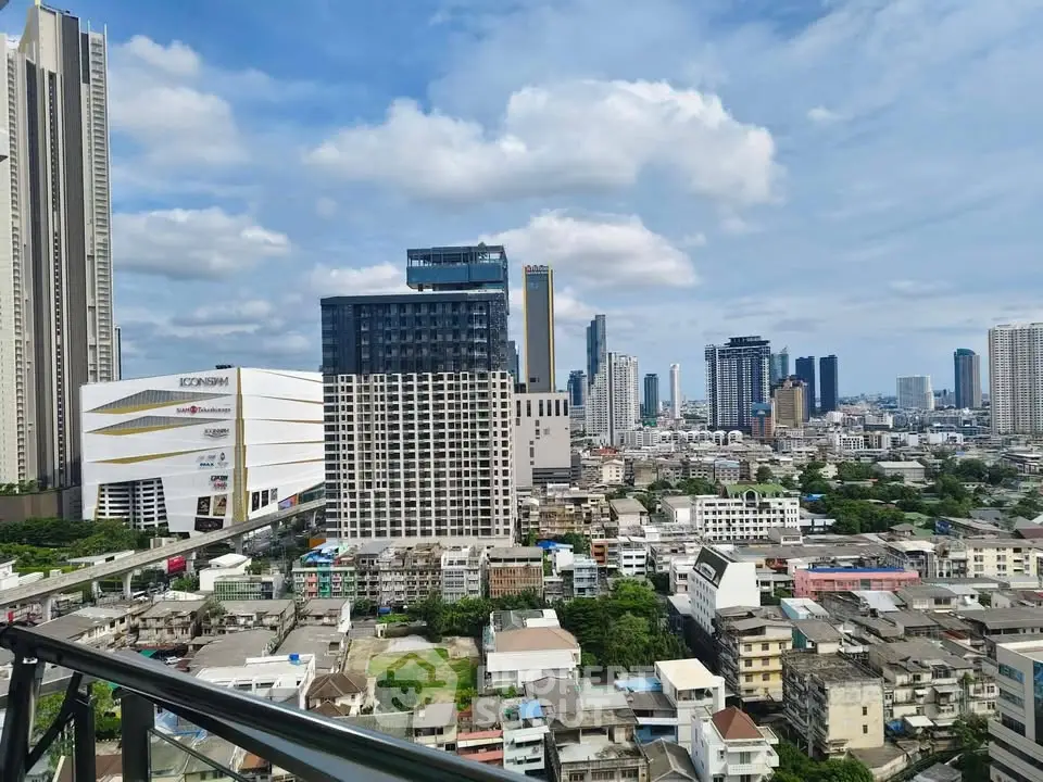 Stunning cityscape view from a high-rise balcony showcasing modern skyscrapers and urban landscape.