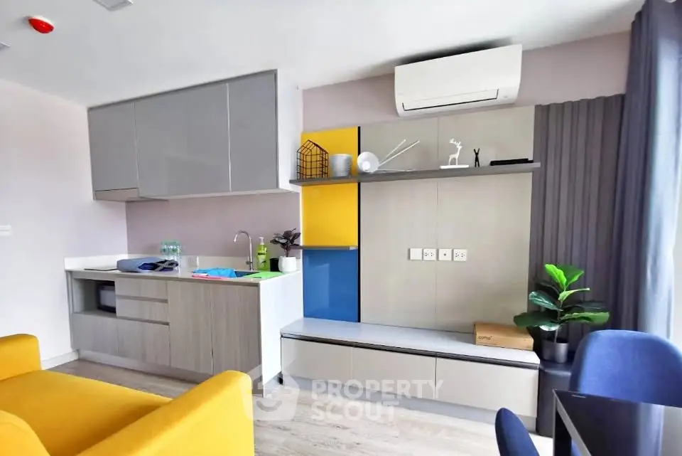 Modern living room with stylish furniture and air conditioning