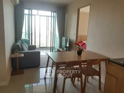 Modern living room with balcony view and stylish furniture