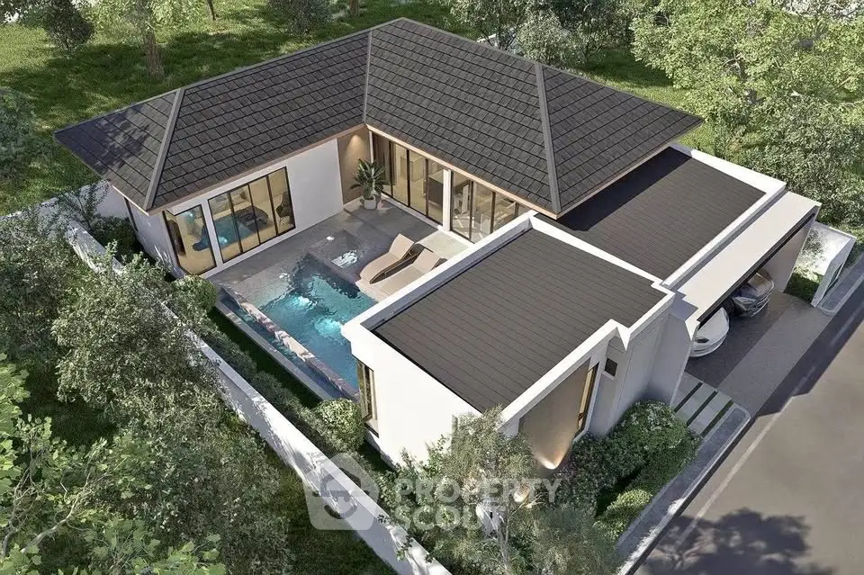 Luxurious modern villa with private pool and lush garden in serene neighborhood.