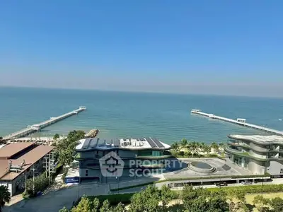 Stunning oceanfront view from luxury apartment with modern architecture and private piers.
