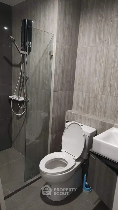 Modern bathroom with sleek shower and contemporary fixtures