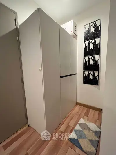 Compact storage area with modern design and wooden flooring
