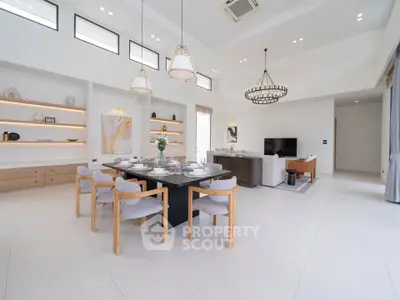 Spacious modern living room with elegant dining area and stylish decor
