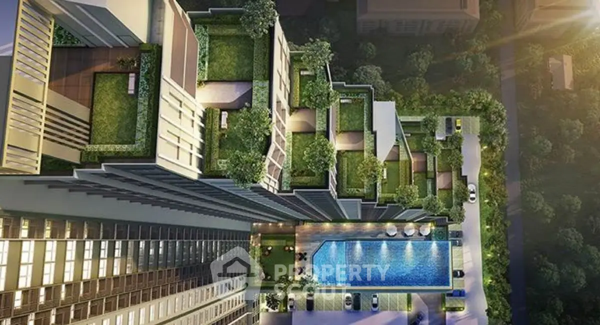 Stunning aerial view of modern high-rise with rooftop pool and lush green terraces.
