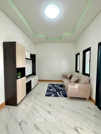 Modern living room with sleek furniture and stylish decor