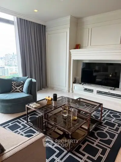 Luxurious living room with modern decor and city view, featuring elegant furniture and large windows.