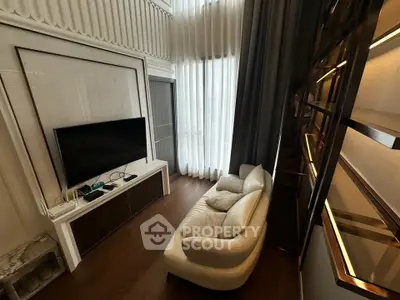 Luxurious living room with high ceilings and elegant decor