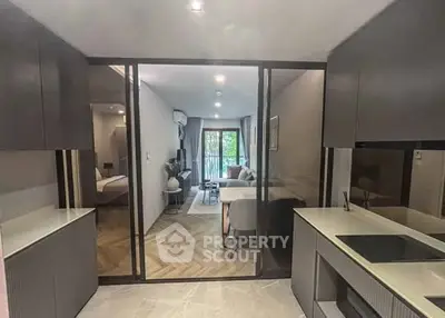 Modern apartment interior with open kitchen and stylish living area