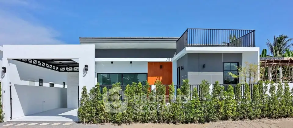 Modern minimalist house with rooftop terrace and sleek design