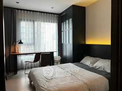 Modern bedroom with stylish decor and natural light