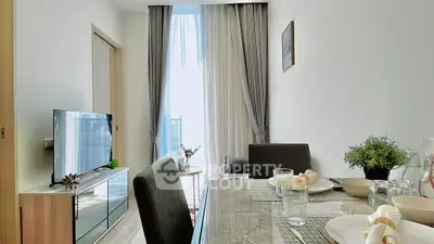 Modern dining area with natural light and stylish decor in a contemporary apartment.