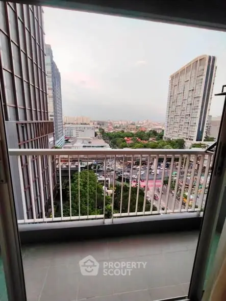Stunning city view from a high-rise balcony, perfect for urban living enthusiasts.