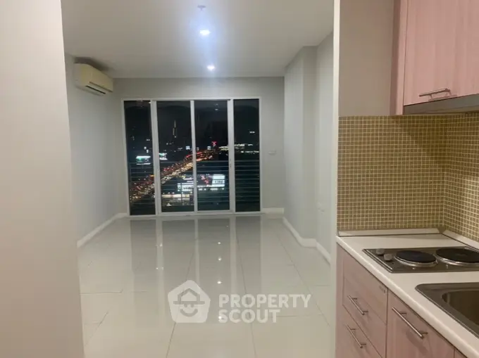 Modern apartment with open layout and city view from balcony