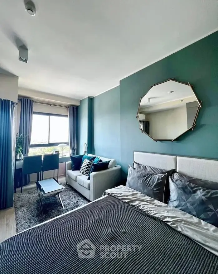 Stylish bedroom with modern decor and large window view
