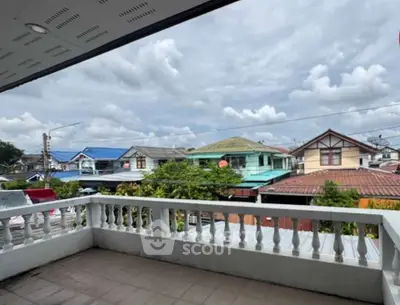 Spacious balcony with scenic neighborhood view, perfect for relaxation and outdoor enjoyment.