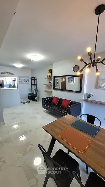 Modern living room with stylish decor and dining area