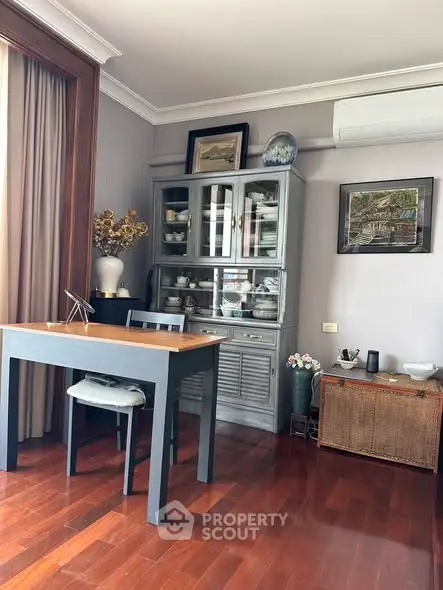 Charming dining area with elegant wooden flooring and stylish decor