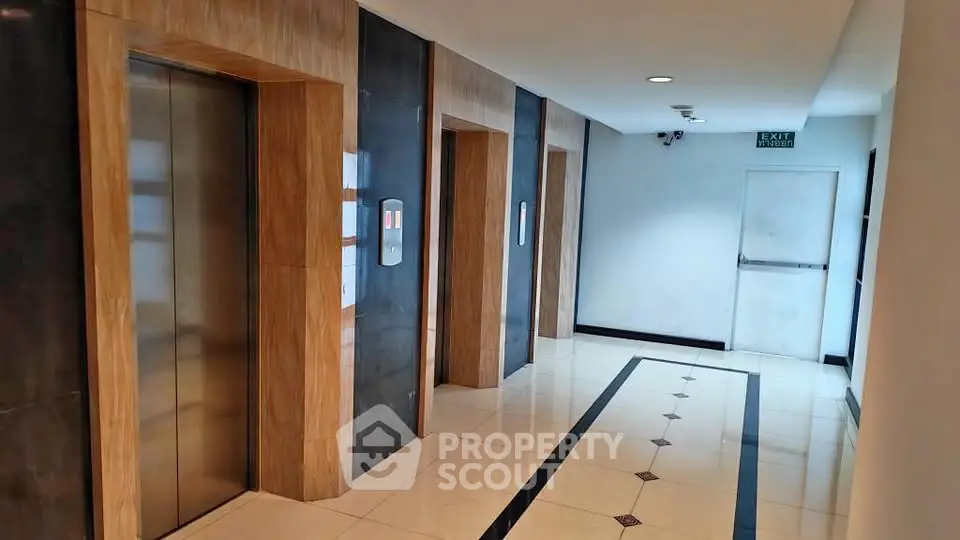 Modern elevator lobby with sleek design and polished floors