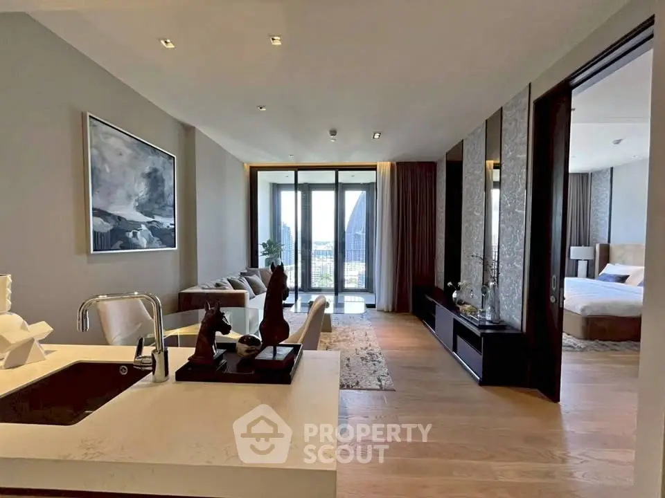 Luxurious open-plan living room with modern kitchen and stunning city view