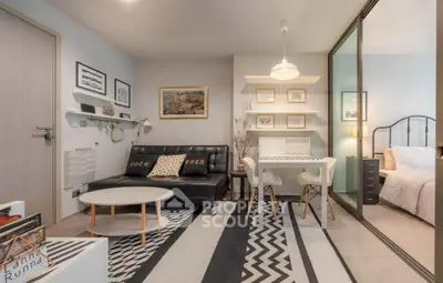 Stylish modern living room with cozy decor and adjacent bedroom view