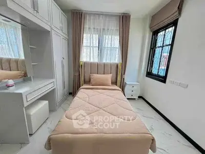 Cozy bedroom with single bed and elegant decor