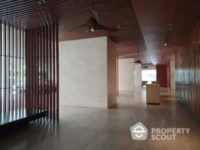 Elegant modern lobby with wooden accents and natural light